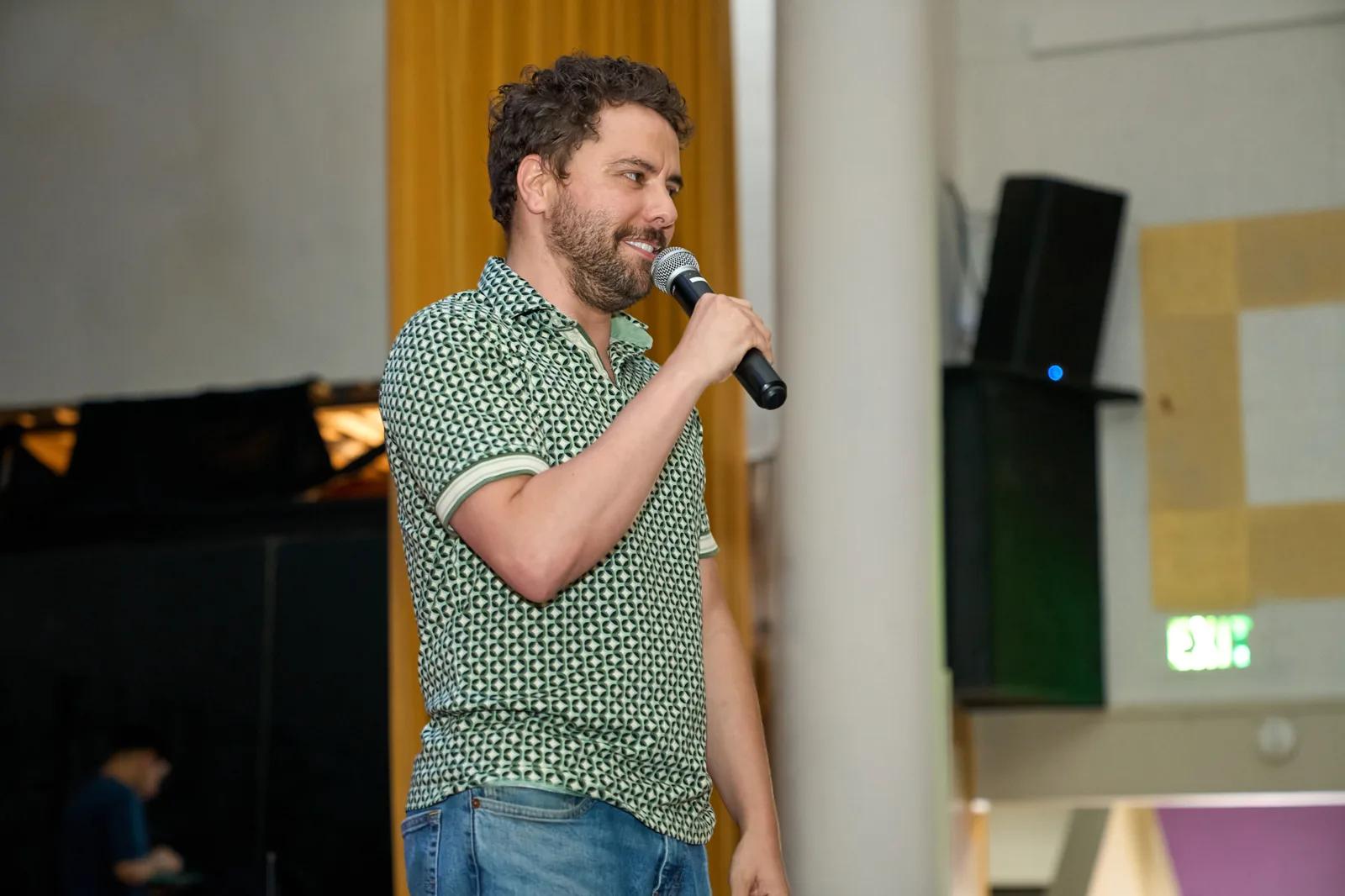 A speaker addressing guests during the Gala program.