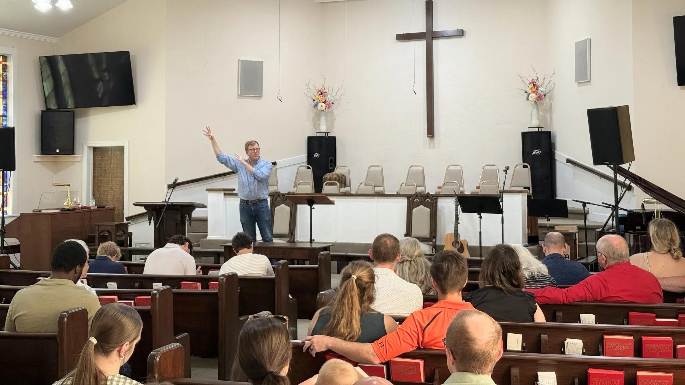 People worshiping together at Trinity Fellowship.