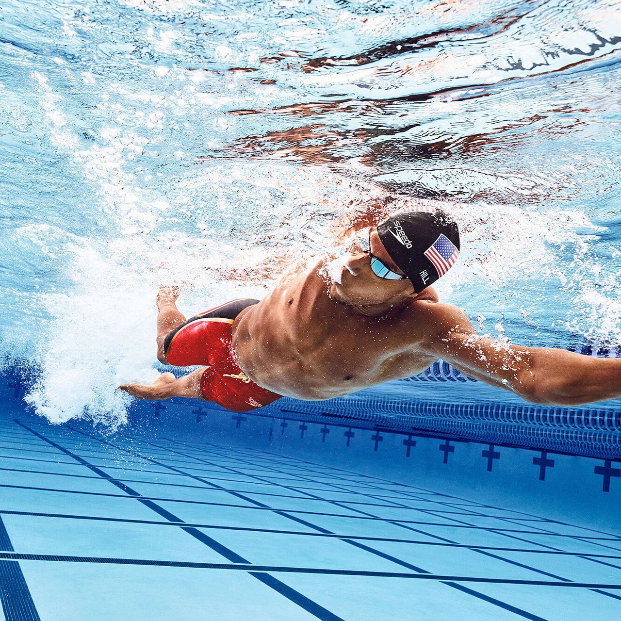 Jamal Hill competing in Swimming