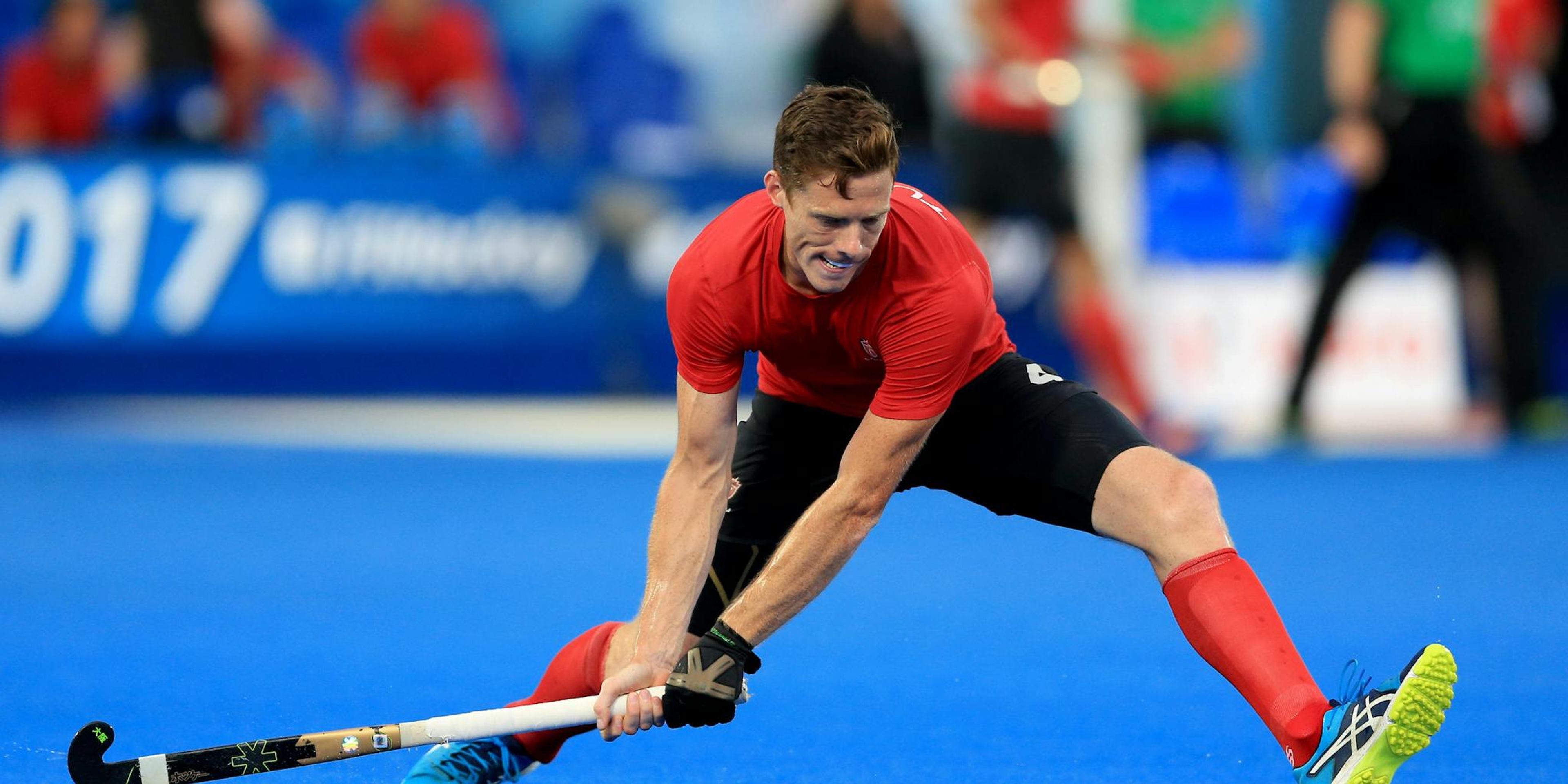 Scott Tupper competing in Field Hockey