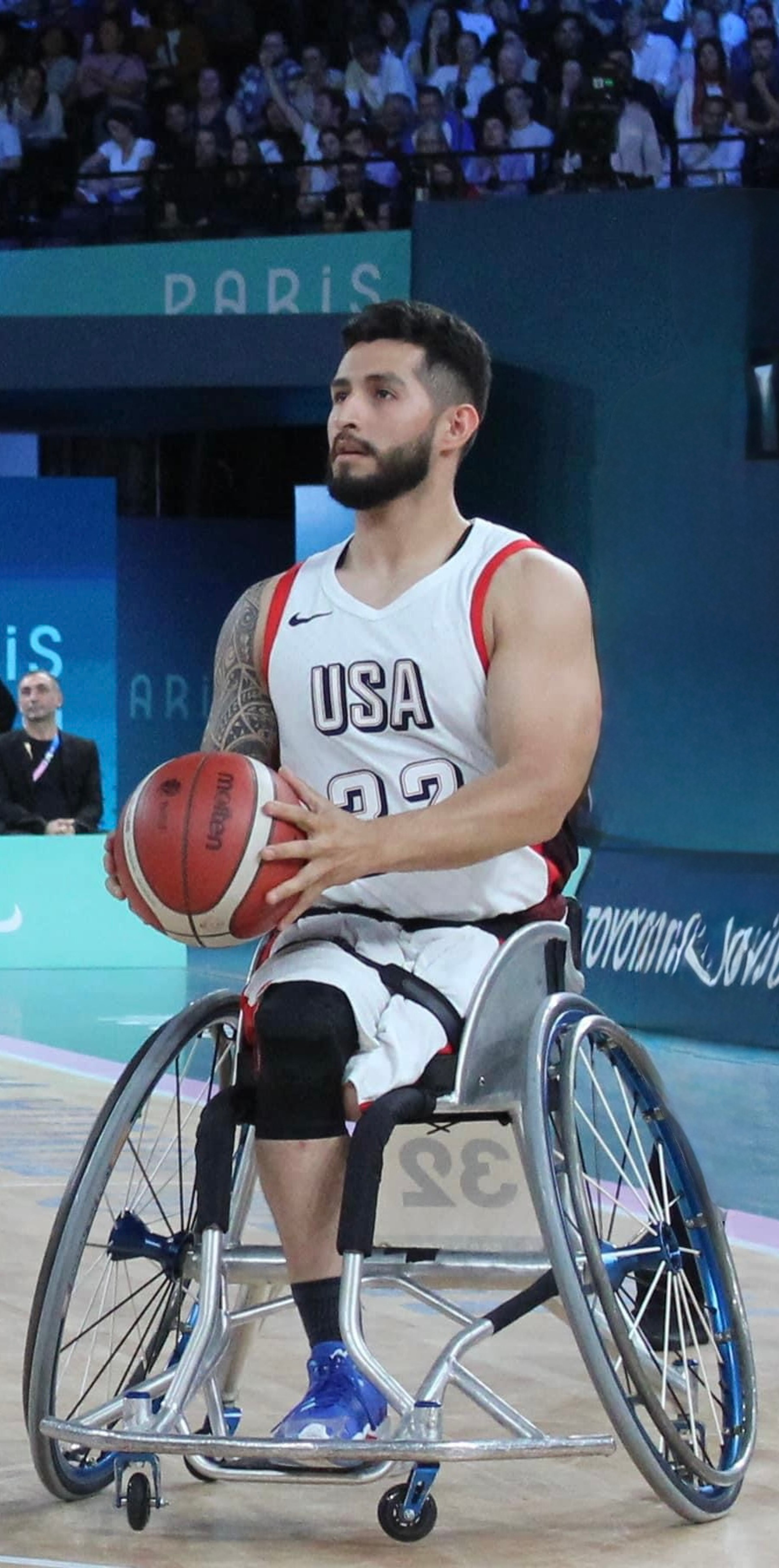 Fabian Romo playing wheelchair basketball