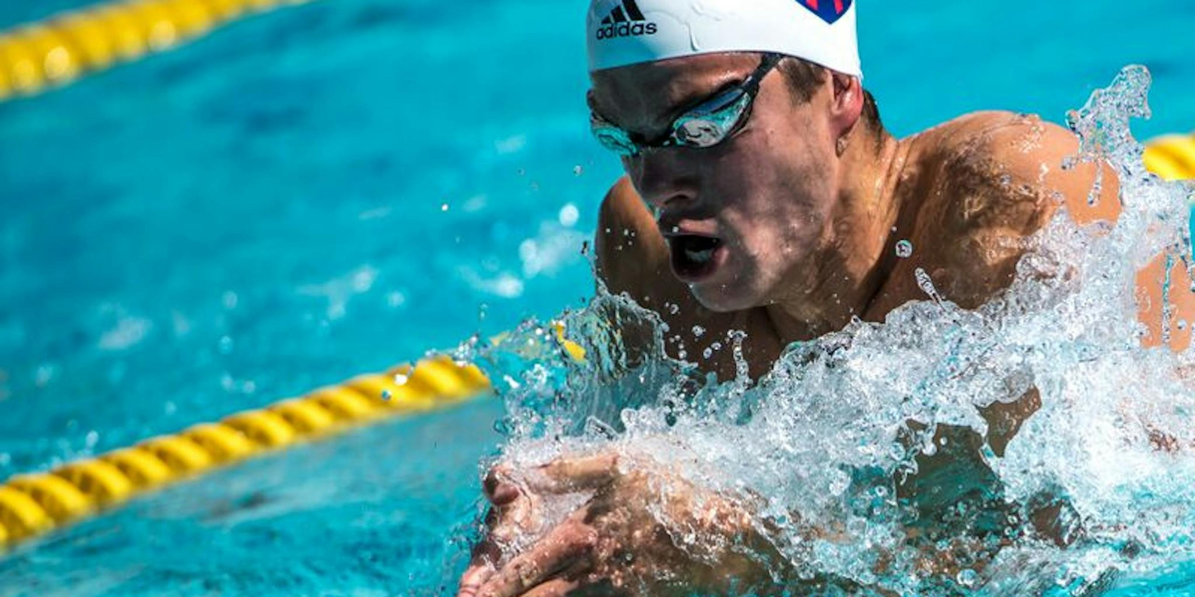 Josh Prenot competing in Swimming
