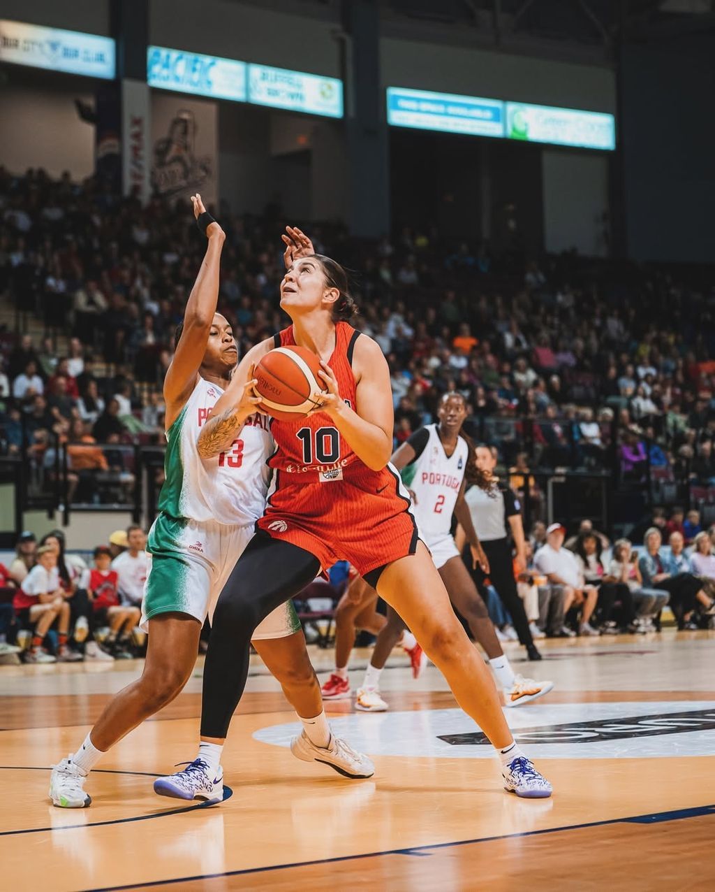Emily Potter competing in Basketball
