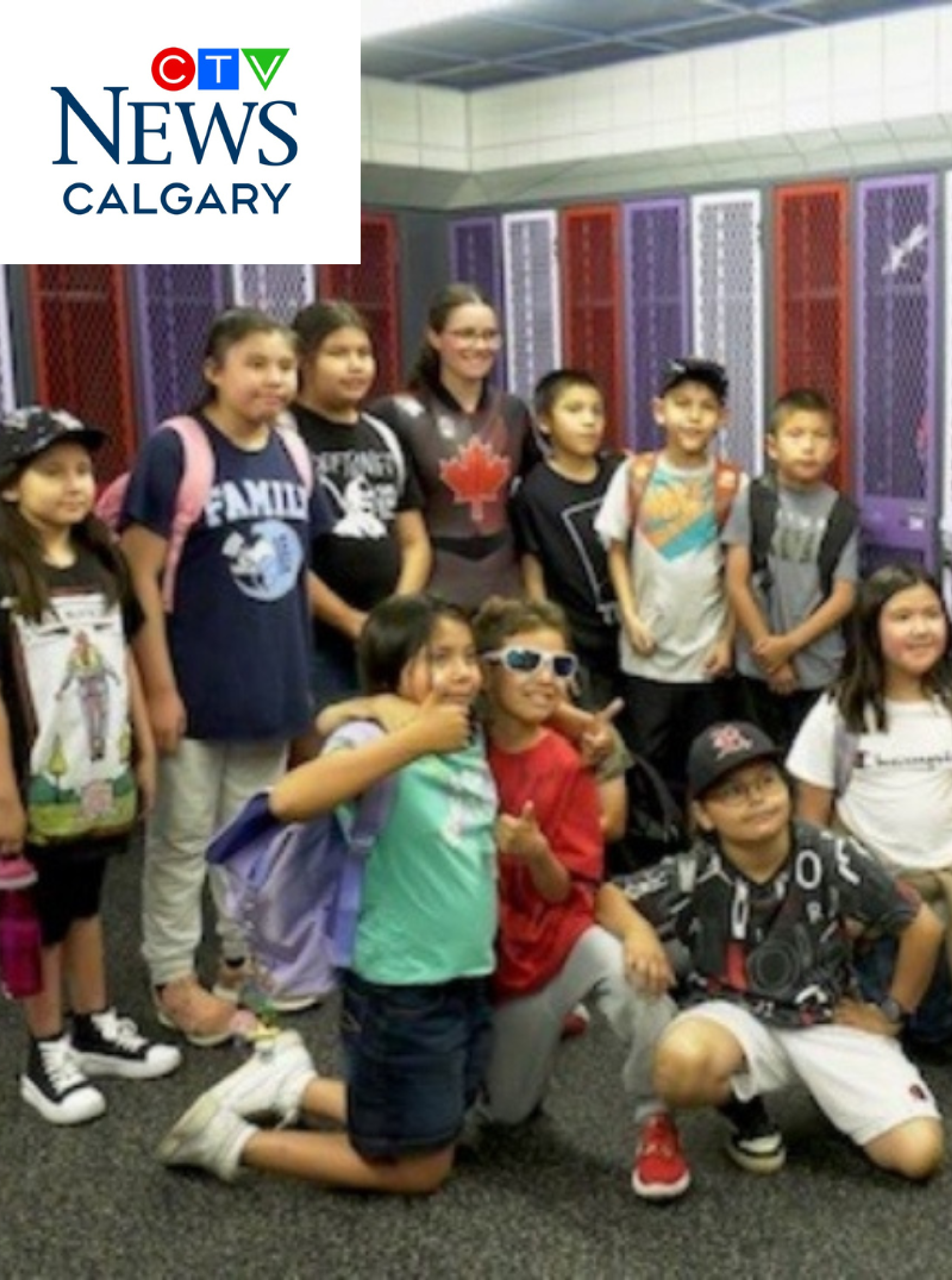 A group of students pose together in a school locker room, featured in a CTV News Calgary story.