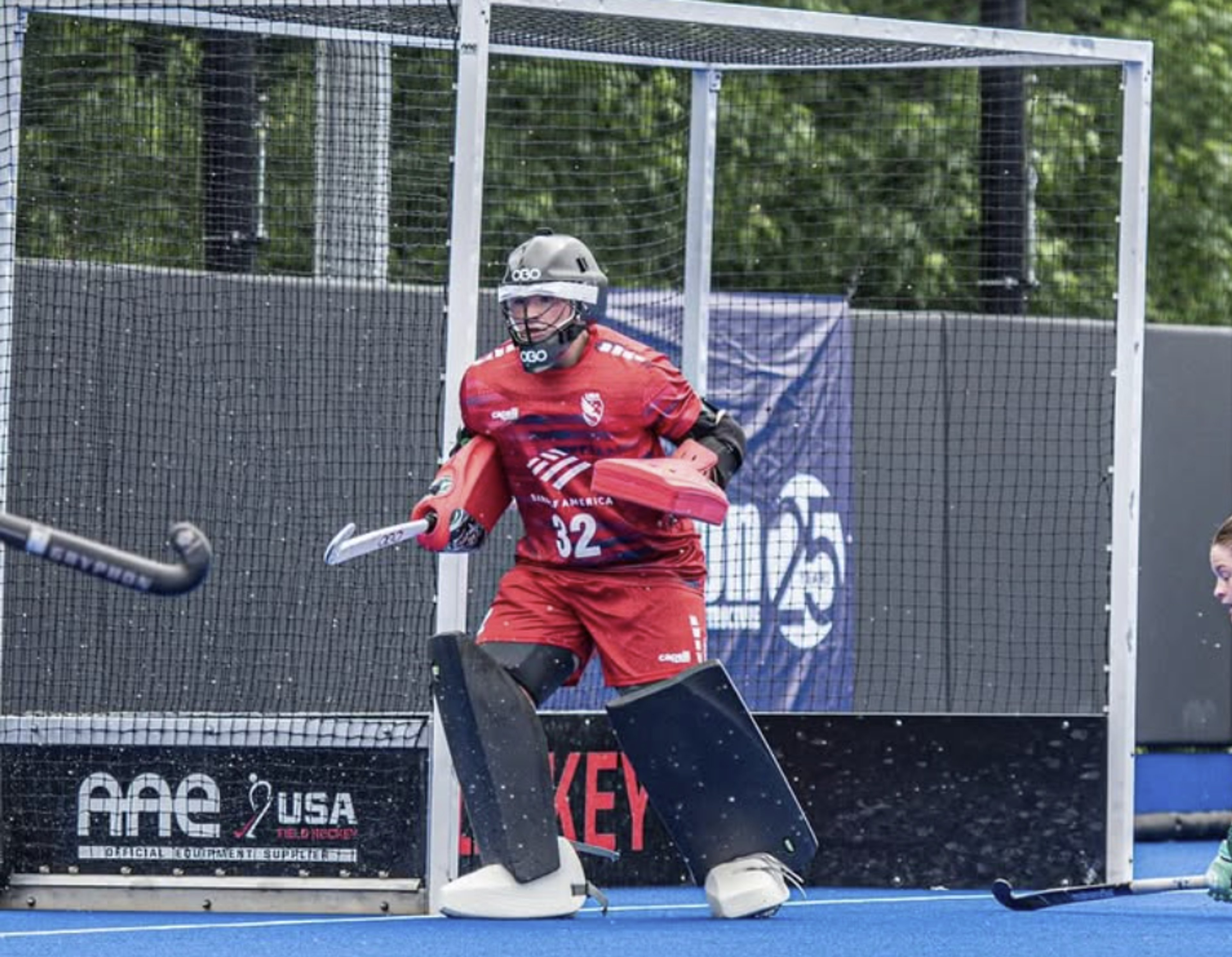 Jenny Rizzo playing field hockey goal keeper