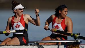 Olivia McMurray competing in Rowing