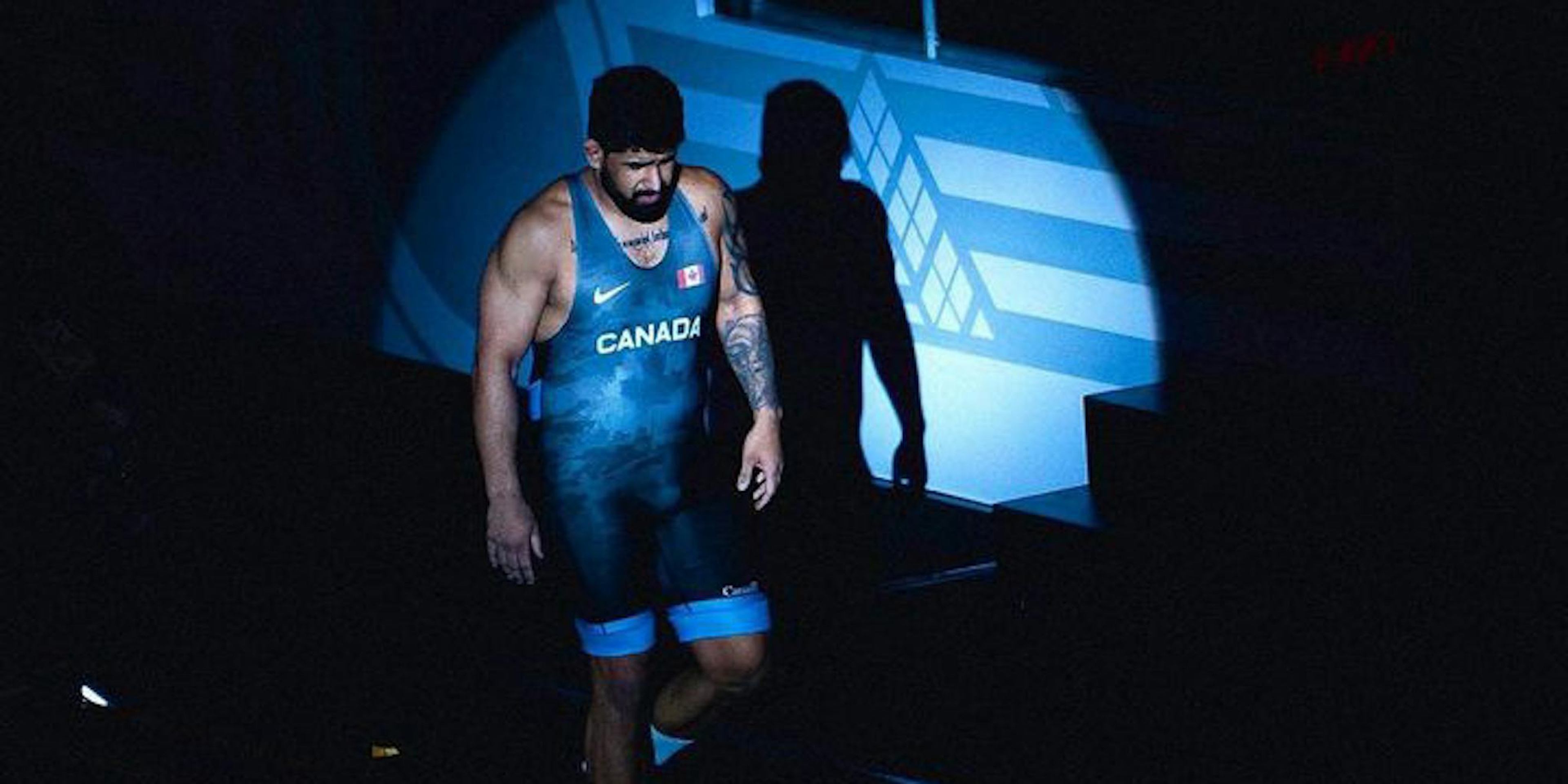 Amar Dhesi competing in Wrestling