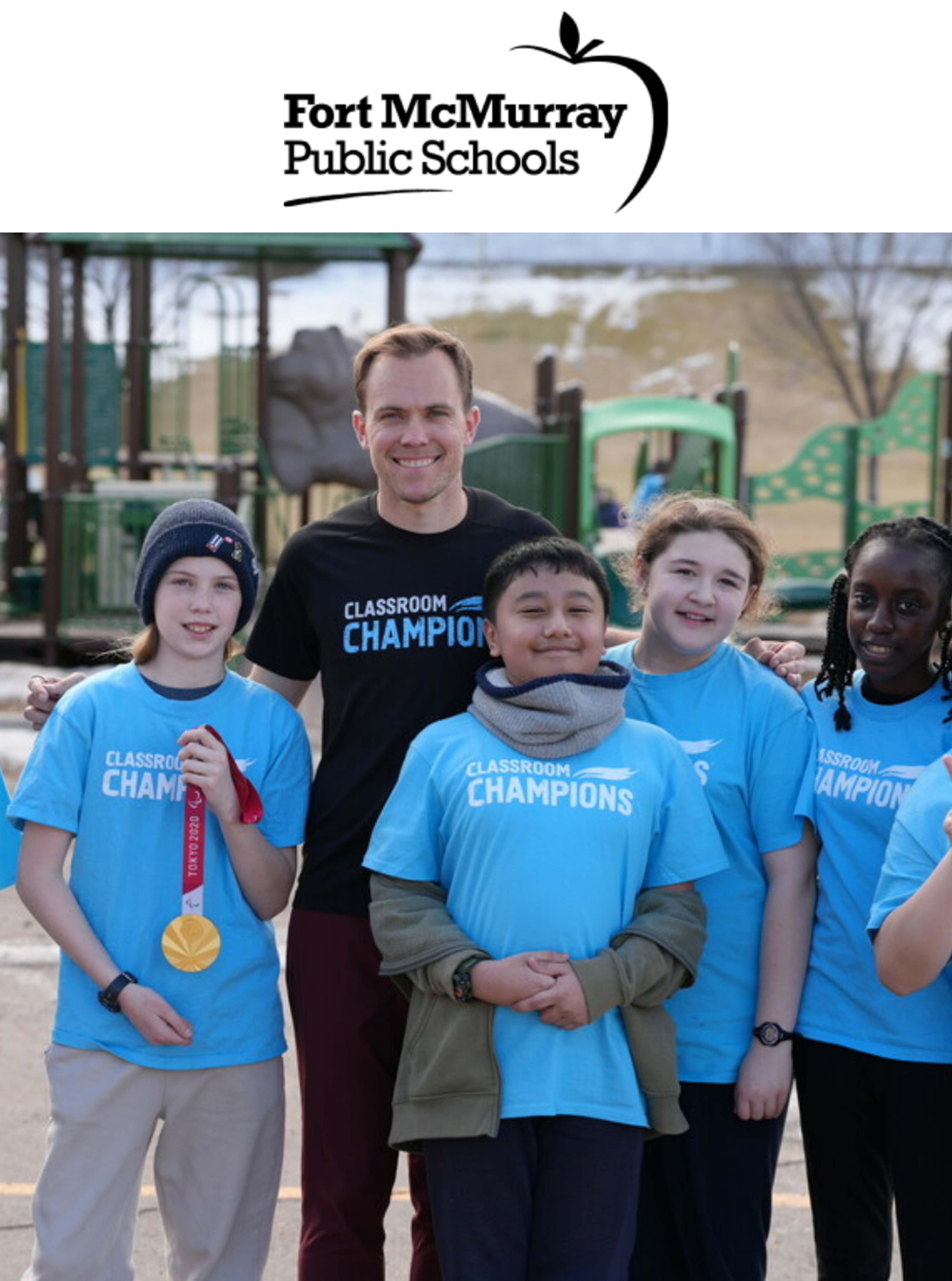 Fort McMurray Public Schools logo above an athlete mentor with students wearing Classroom Champions shirts, one holding a medal.