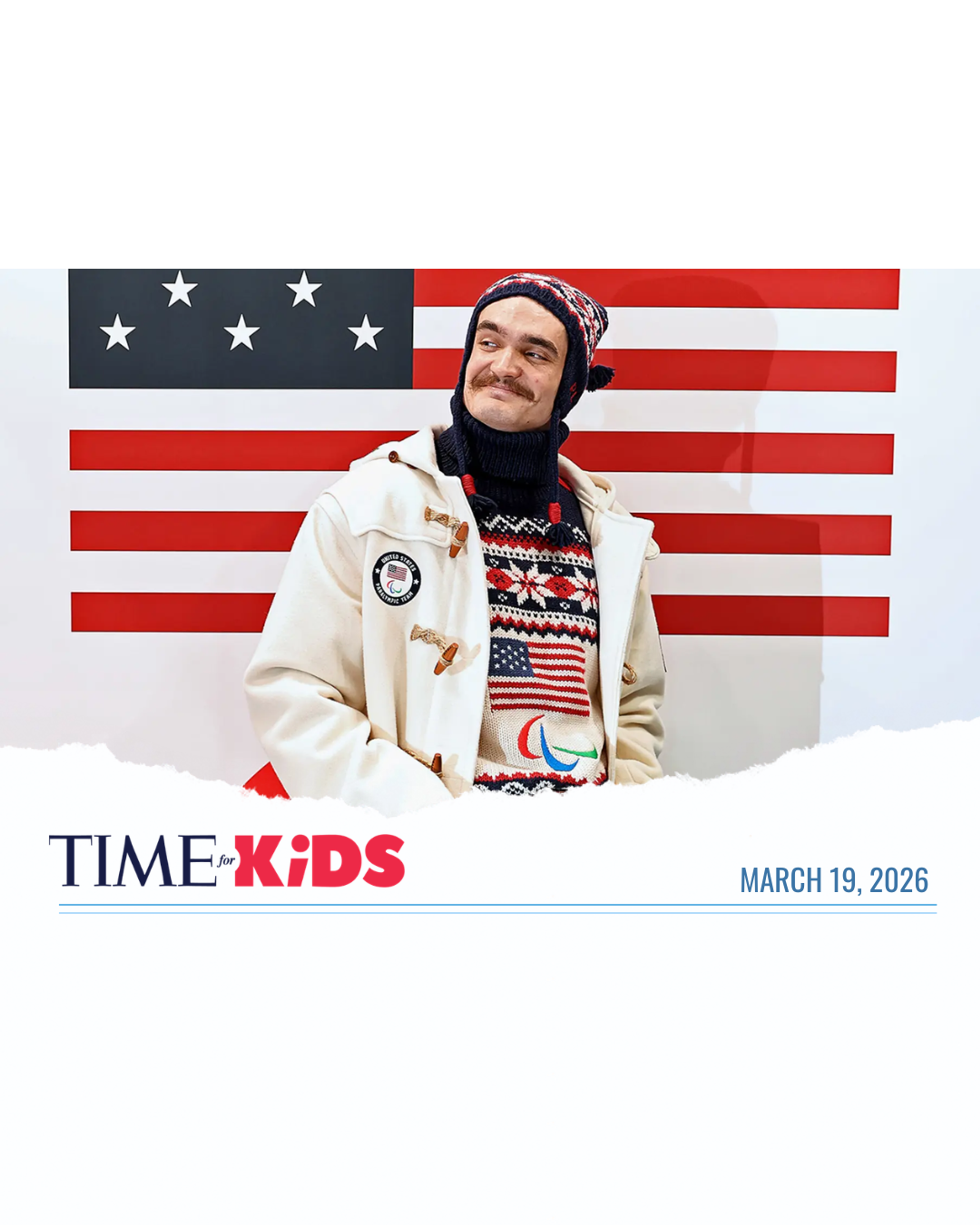 Team USA Paralympic athlete in team gear stands before a US flag backdrop, featured in a TIME for Kids article.