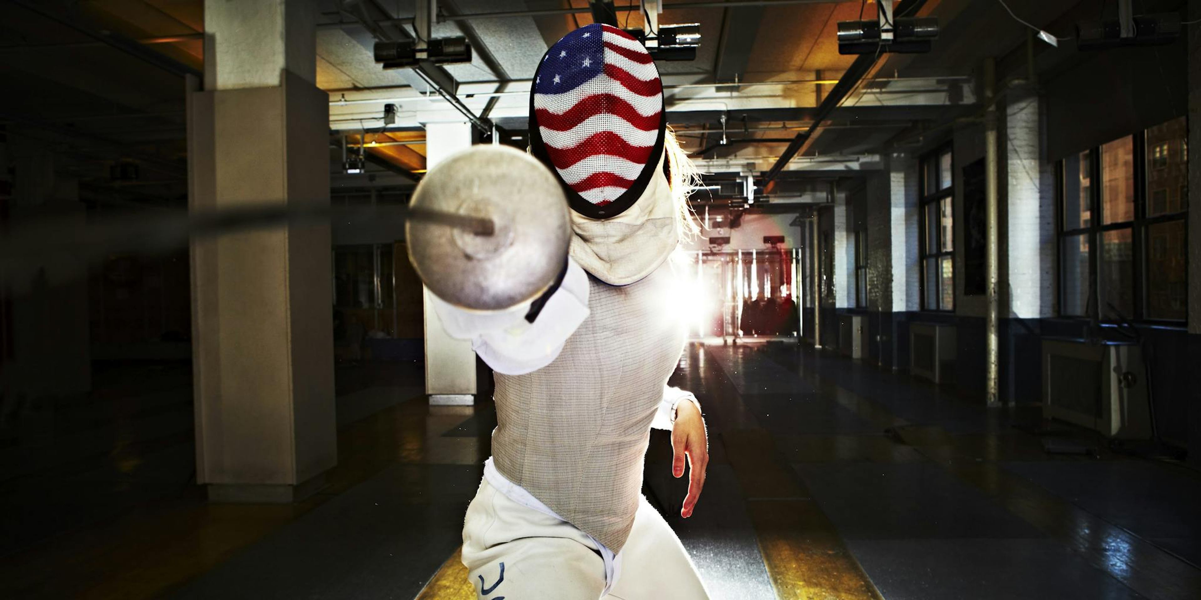 Jacqueline Dubrovich competing in Fencing