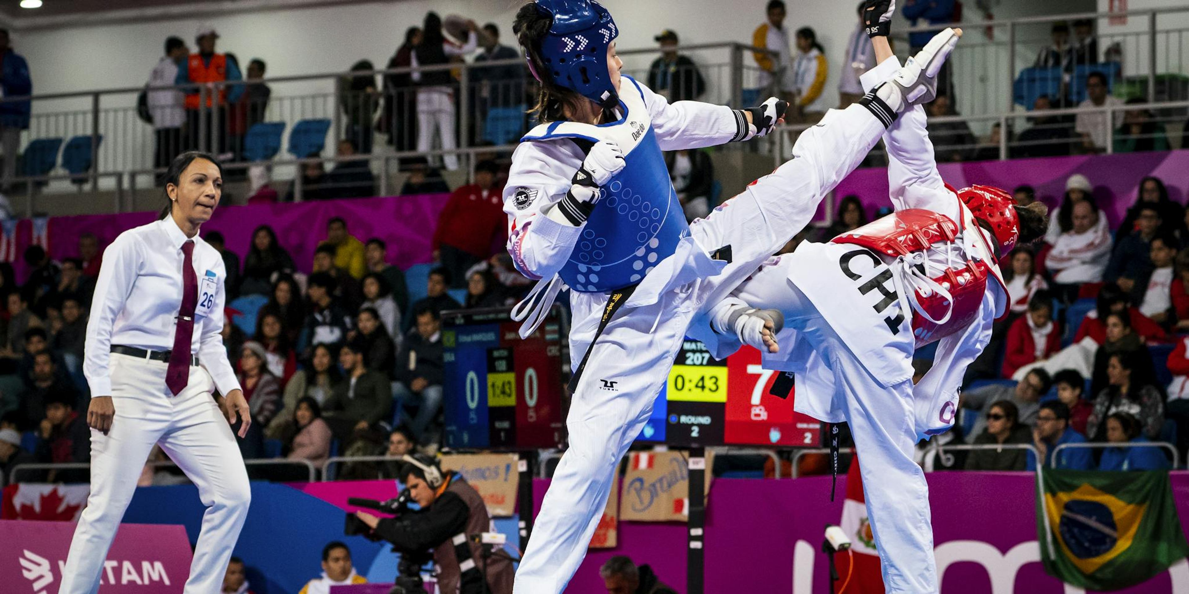 Skylar Park competing in Taekwondo