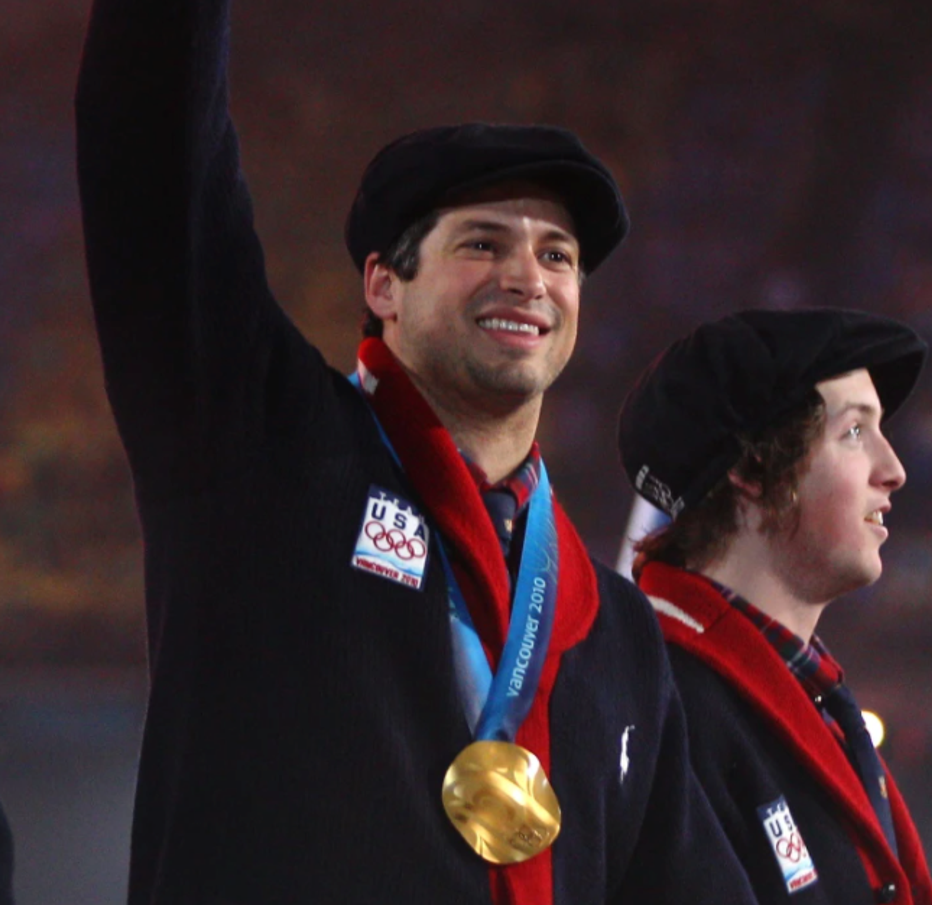 Team USA athletes wear their Vancouver 2010 Olympic medals during a medal ceremony.