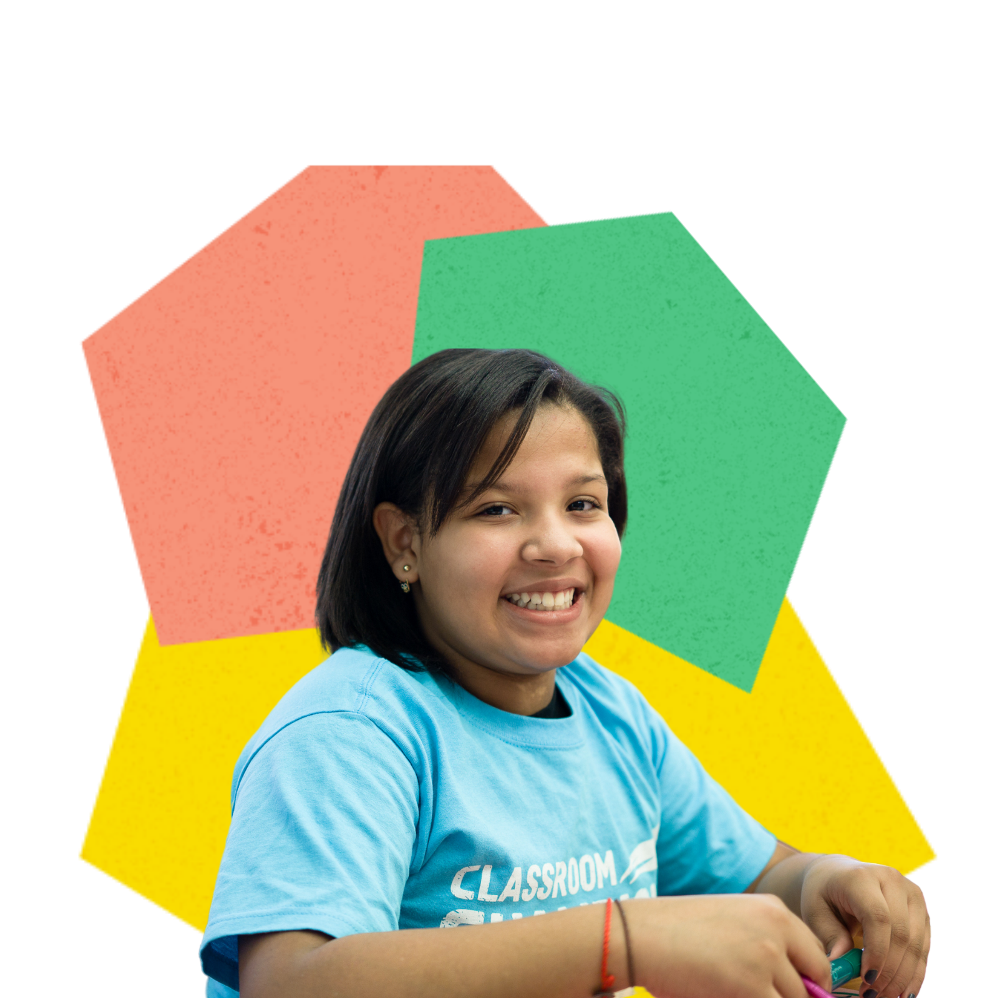 Smiling student wearing a Classroom Champions t-shirt.