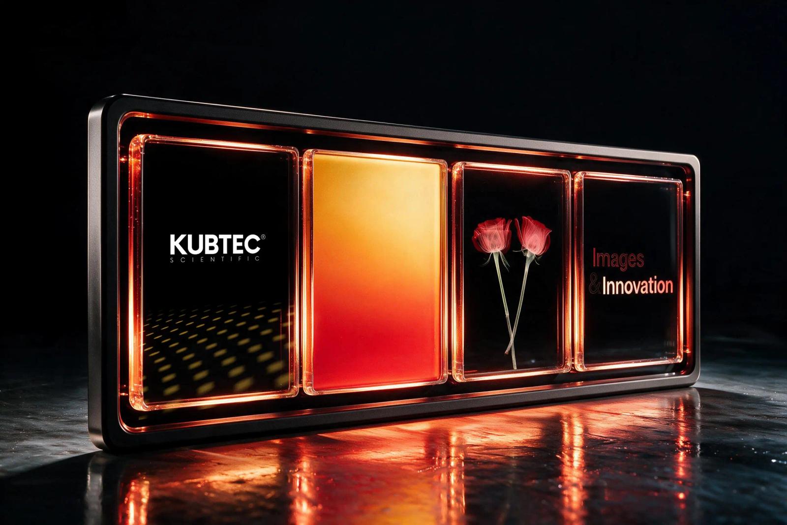 KUBTEC homepage displayed on a glass panel with a glowing amber-red fire stroke