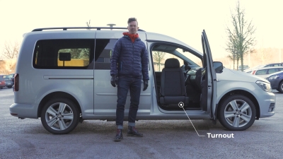 Silver van with Turnout rotating seat visible from passenger side
