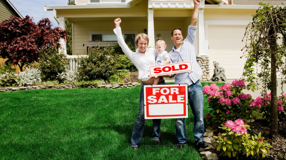 family buying their first home