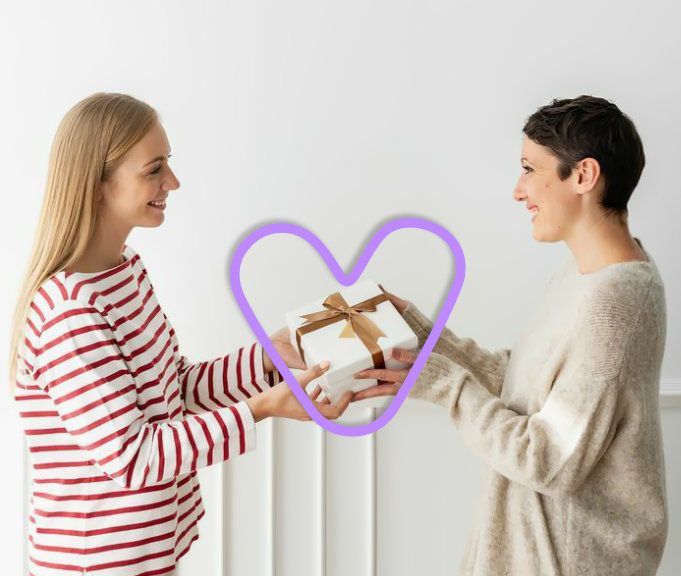 Two people exchanging a thoughtful gift
