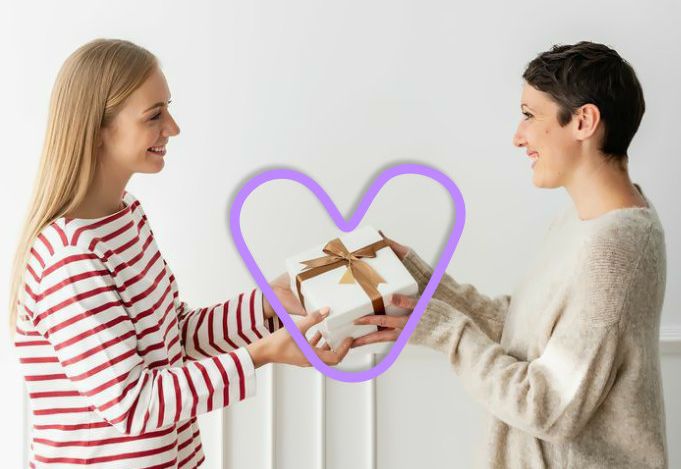Two people exchanging a thoughtful gift