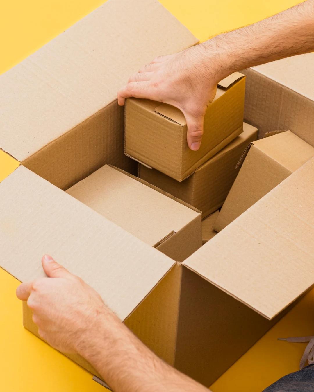 Open cardboard package representing the Waybill logo idea