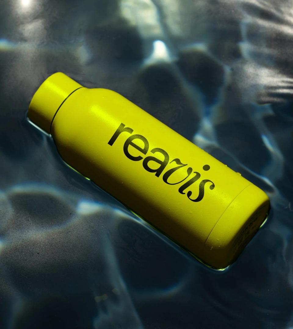 Reavis yellow branded water bottle