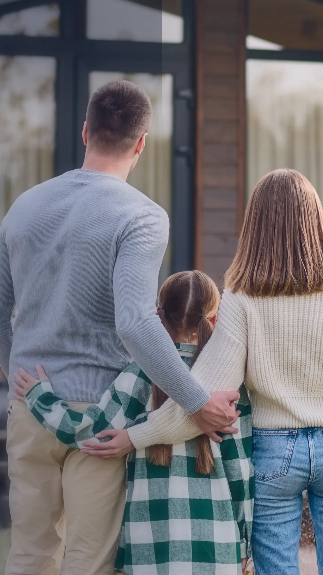 Family looking at their dream home
