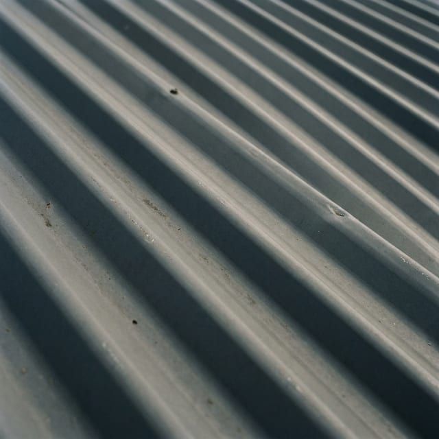 Corrugated steel roof sheeting