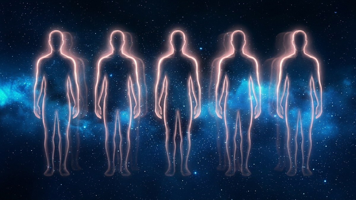 Identical luminous silhouettes fading into one another in cosmic light, illustrating 7th house astrology meaning of attraction patterns