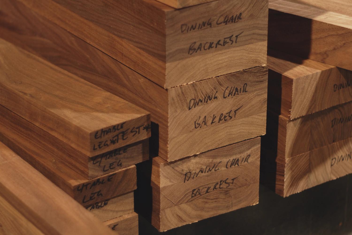 Close up of stacked timber ready to be used in the Elements furniture range