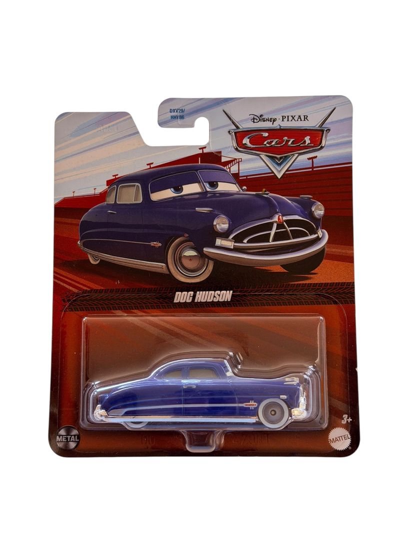 Empaque de cartón con blister transparente que contiene el auto de metal Doc Hudson color azul de Disney Pixar Cars.