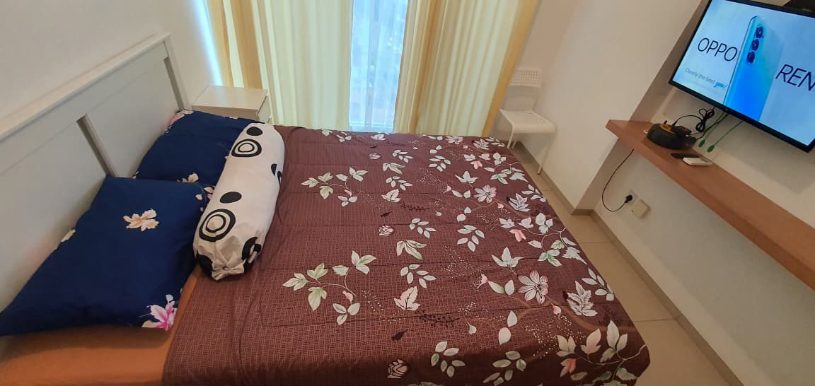 Studio A bedroom and smart TV