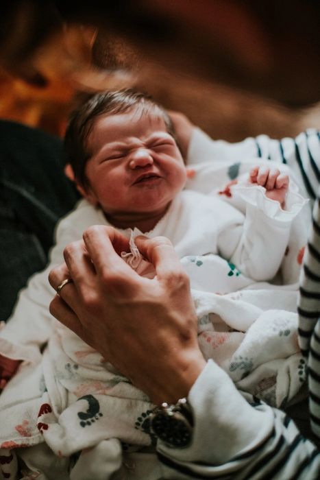 Baby making a scrunched-up face