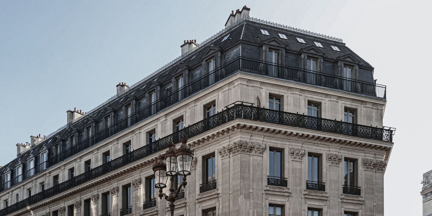 Elegant exterior of a classic Haussmann apartment in Paris with period architectural details