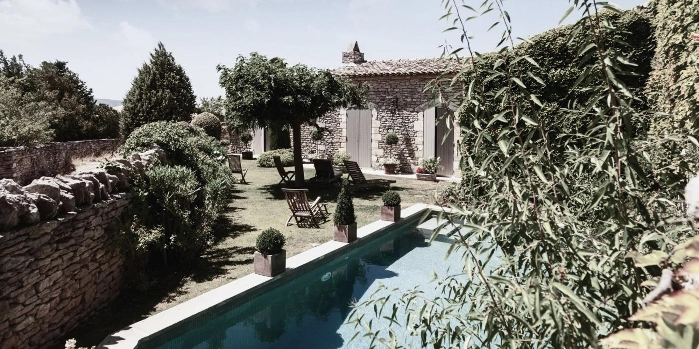 Luxury Provençal villa with outdoor swimming pool surrounded by olive trees
