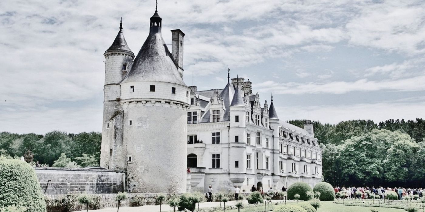 Historic French château with stone walls and manicured grounds