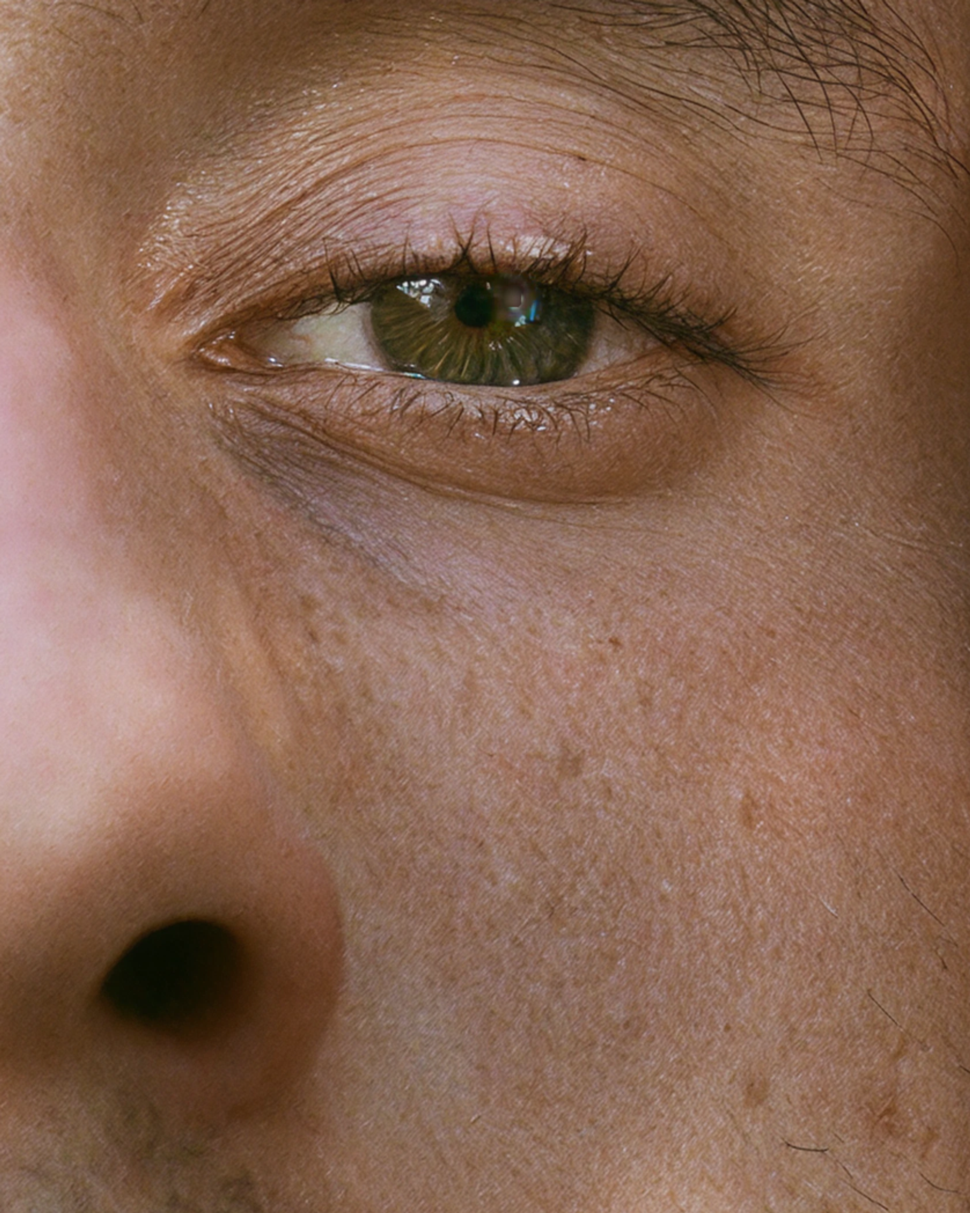 Close-up of hydrated skin around a person's eye