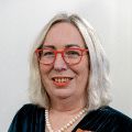 Cindy Johns ONZM smiling at the camera.