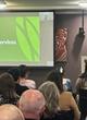 Louise Upston behind a lectern