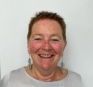 image of Alison with a grey shirt smiling.
