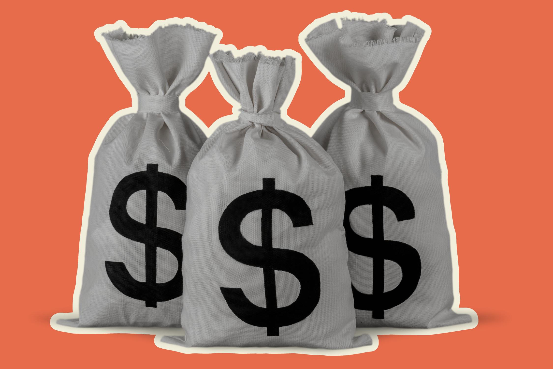 Three bags with dollar signs on them on an orange background.
