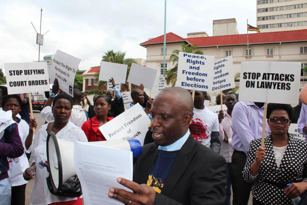 Zimbabwe’s human rights lawyers urge government to promote human rights and democracy in a demonstration, Feb. 27 2021. 