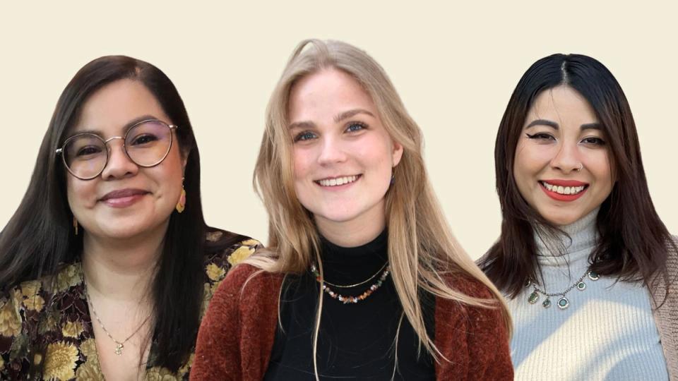 Three smiling diverse women against a light background.