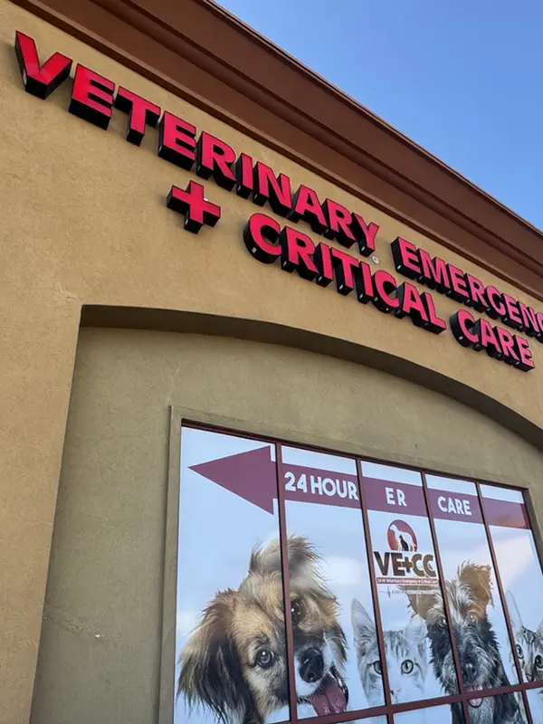 Front entrance to the vet emergency center with bold red lettering.
