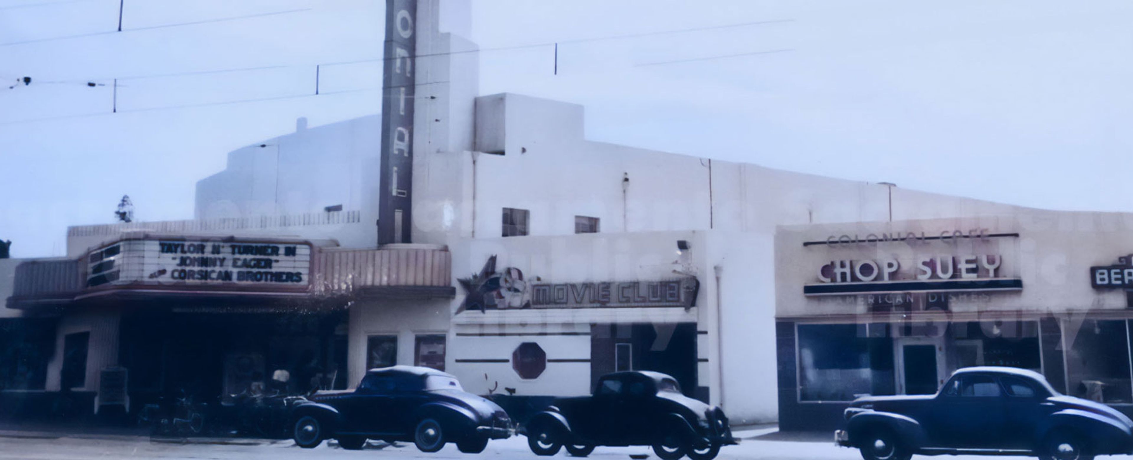 Old photo of the front of the Colonial Theater building