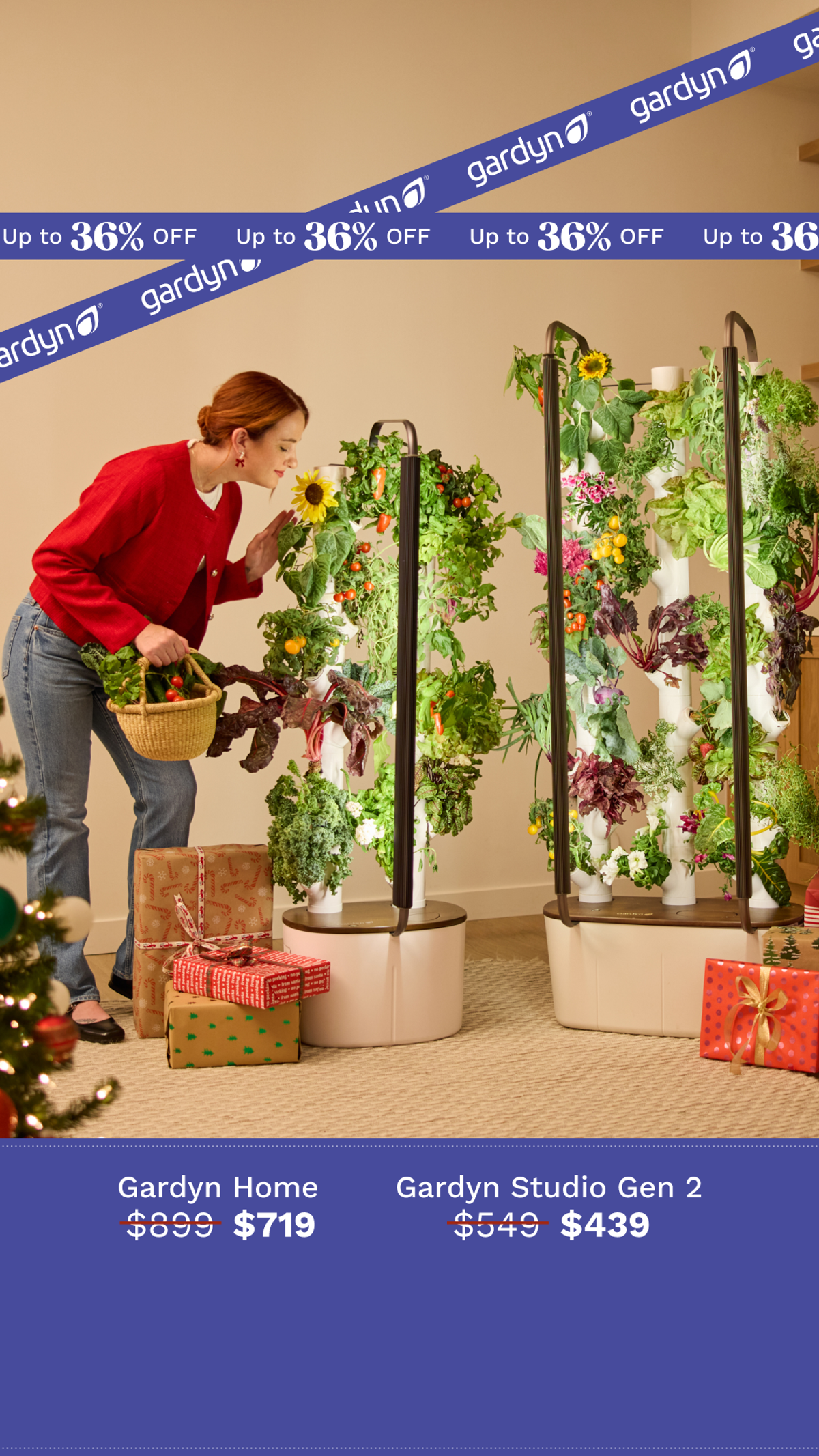 Gardyn ad showing a person beside two indoor garden models with model names and promotional prices