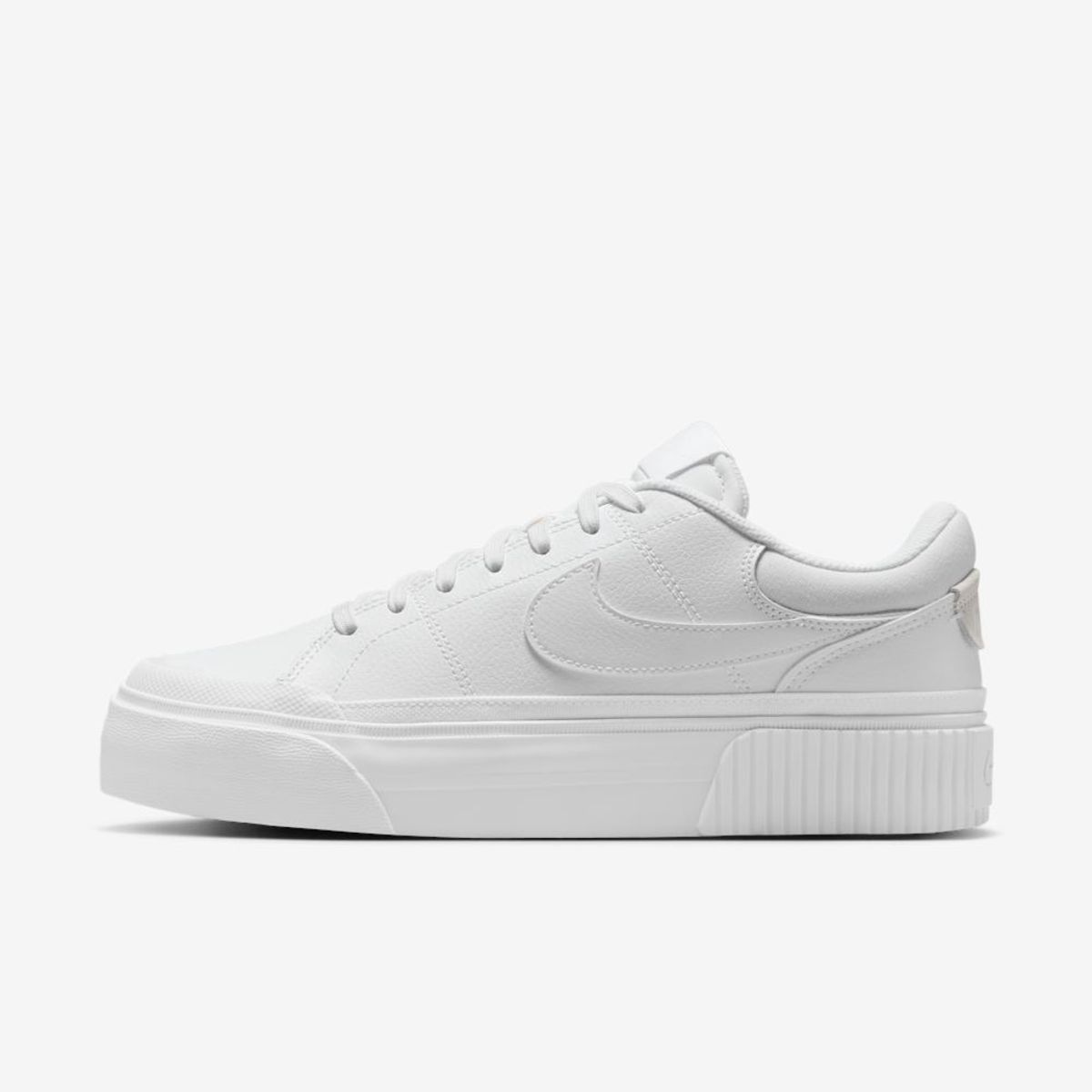 Nike white shoe in side profile