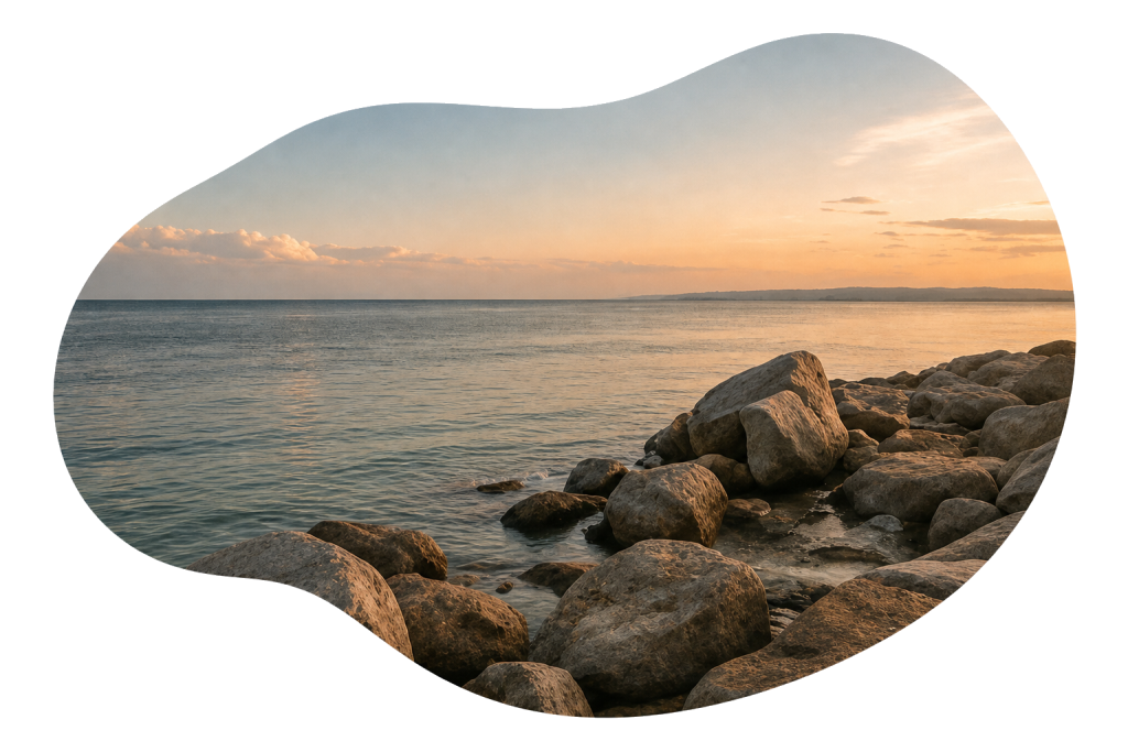 A calm shoreline in soft, muted daylight