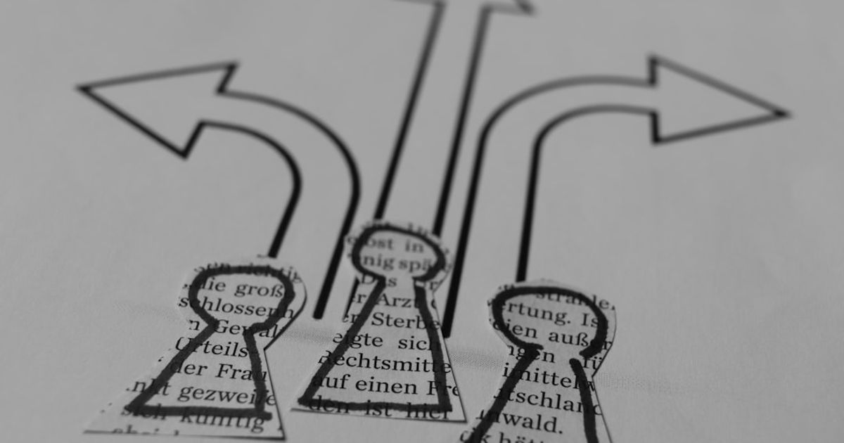 a close up of a piece of paper with arrows