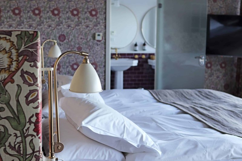 Vår Gård hotell svit lucky säng