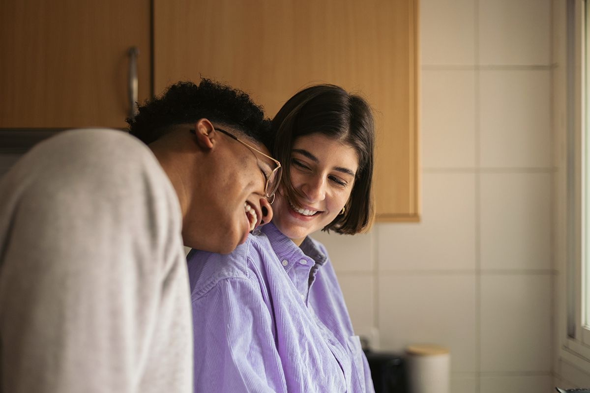 Two people laughing