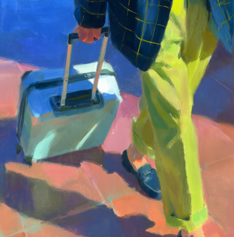 Person walking with a travel luggage.